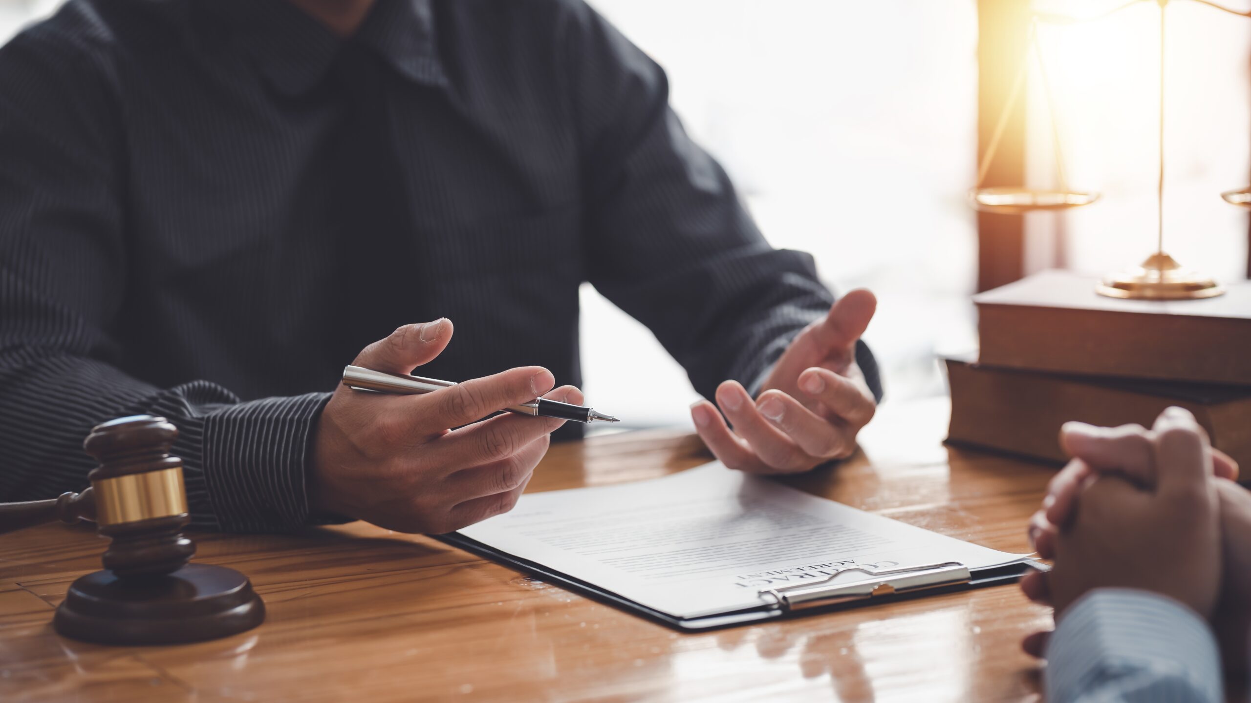 Monument Legal brain injury attorneys reviewing medical records for traumatic brain injury claim